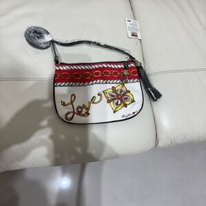 Elegant Red and White Clutch with Gold Accents